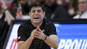 Jan 11, 2025; Cincinnati, Ohio, USA;  Cincinnati Bearcats head coach Wes Miller works the sideline against the Kansas Jayhawks in the second half at Fifth Third Arena. Mandatory Credit: Aaron Doster-Imagn Images