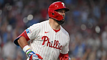 Sep 23, 2025; Philadelphia, Pennsylvania, USA; Philadelphia Phillies outfielder Kyle Schwarber (12) watches his home run during the first inning against the Miami Marlins at Citizens Bank Park. Mandatory Credit: Eric Hartline-Imagn Images