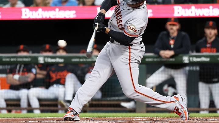 Apr 11, 2026; Baltimore, Maryland, USA; San Francisco Giants designated hitter Rafael Devers (16) hits a single during the second inning against the Baltimore Orioles at Oriole Park at Camden Yards. Mandatory Credit: Daniel Kucin Jr.-Imagn Images