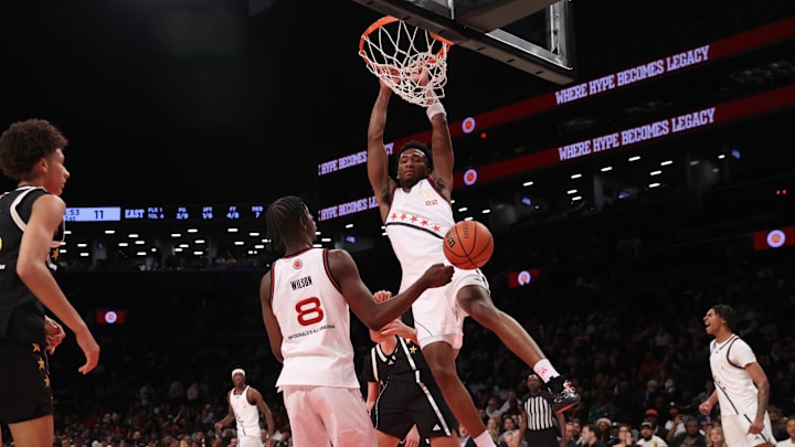Apr 1, 2025; Brooklyn, NY, USA; McDonald's All American West guard Darryn Peterson (22) dunks the ball during the first half of the game at Barclays Center. Mandatory Credit: Pamela Smith-Imagn Images