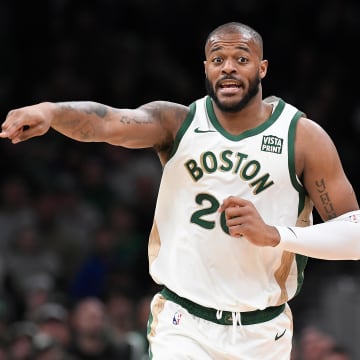 Apr 7, 2024; Boston, Massachusetts, USA; Boston Celtics forward Xavier Tillman Sr. (26) reacts to game action against the Portland Trail Blazers during the second half at TD Garden. Mandatory Credit: Eric Canha-USA TODAY Sports