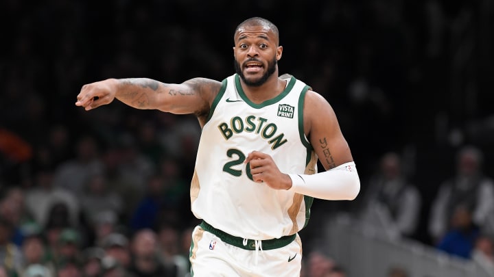 Apr 7, 2024; Boston, Massachusetts, USA; Boston Celtics forward Xavier Tillman Sr. (26) reacts to game action against the Portland Trail Blazers during the second half at TD Garden. Mandatory Credit: Eric Canha-USA TODAY Sports