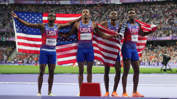 Christopher Bailey (USA), Vernon Norwood (USA), Bryce Deadmon (USA) and Rai Benjamin (USA) celebrate winning the men's 4x400m