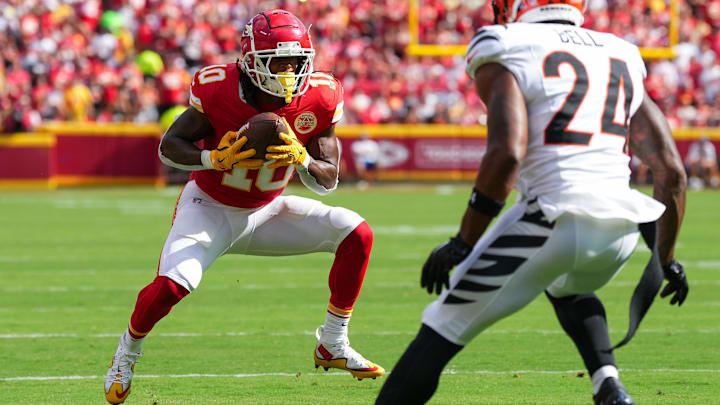 Sep 15, 2024; Kansas City, Missouri, USA; Kansas City Chiefs running back Isiah Pacheco (10) catches a pass against Cincinnati Bengals safety Vonn Bell (24) at GEHA Field at Arrowhead Stadium. Mandatory Credit: Jay Biggerstaff-Imagn Images