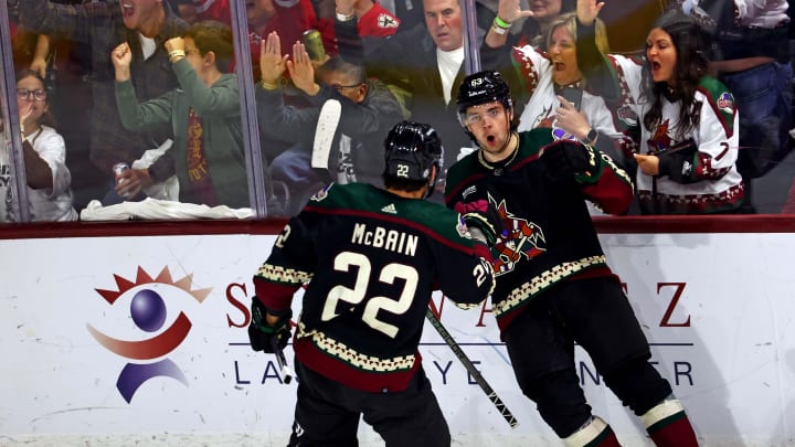 Apr 17, 2024; Tempe, Arizona, USA;  Arizona Coyotes left wing Matias Maccelli (63) celebrates scoring a goal during the second period of the game against the Edmonton Oilers at Mullett Arena. Mandatory Credit: Mark J. Rebilas-USA TODAY Sports