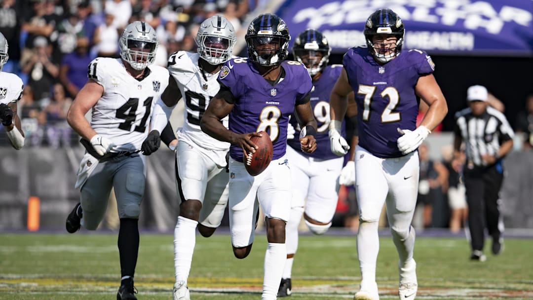 Sep 15, 2024; Baltimore, Maryland, USA;  Baltimore Ravens quarterback Lamar Jackson (8) runs during the second half against the Las Vegas Raiders at M&T Bank Stadium. Mandatory Credit: Tommy Gilligan-Imagn Images