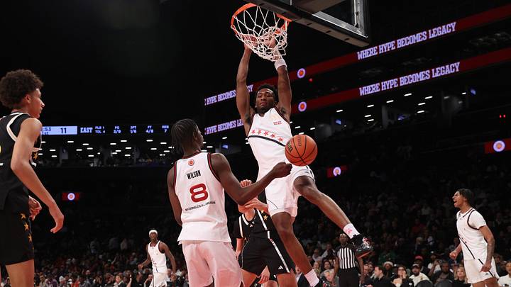 Apr 1, 2025; Brooklyn, NY, USA; McDonald's All American West guard Darryn Peterson (22) dunks the ball during the first half of the game at Barclays Center. Mandatory Credit: Pamela Smith-Imagn Images