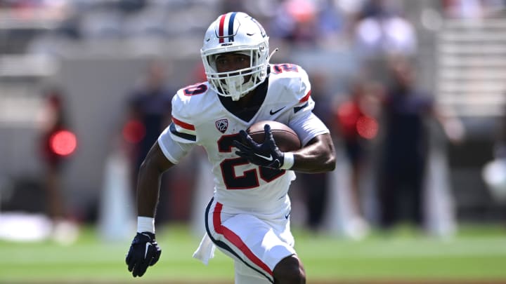 Sep 3, 2022; San Diego, California, USA; Arizona Wildcats running back Rayshon Luke (20) runs the ball against the San Diego State Aztecs during the first half at Snapdragon Stadium