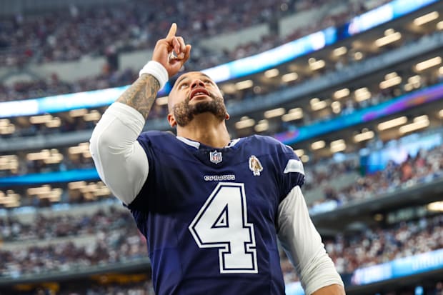 Dallas Cowboys quarterback Dak Prescott prays before the game against the Detroit Lions.