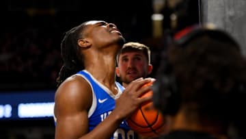Jan 25, 2025; Nashville, Tennessee, USA;  Kentucky Wildcats guard Otega Oweh (00) reacts after missing the basket after a called foul against the Vanderbilt Commodores during the second half at Memorial Gymnasium. Mandatory Credit: Steve Roberts-Imagn Images