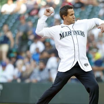 Bret Boone throws out a first pitch in 2021.