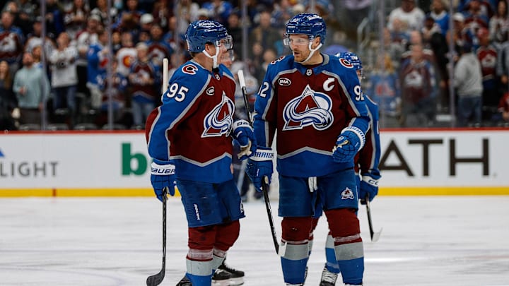 Colorado Avalanche left wing Victor Olofsson (95) and left wing Gabriel Landeskog (92)