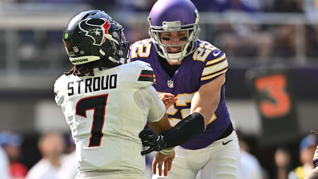 Minnesota Vikings safety Harrison Smith and Houston Texans quarterback C.J. Stroud