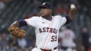 Aug 27, 2025; Houston, Texas, USA; Houston Astros starting pitcher Framber Valdez (59) delivers a pitch during the first inning against the Colorado Rockies at Daikin Park. Mandatory Credit: Troy Taormina-Imagn Images