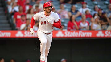Aug 30, 2024; Anaheim, California, USA; Los Angeles Angels left fielder Taylor Ward (3) runs after hitting a solo home run against the Seattle Mariners during the first inning at Angel Stadium. Mandatory Credit: Gary A. Vasquez-Imagn Images