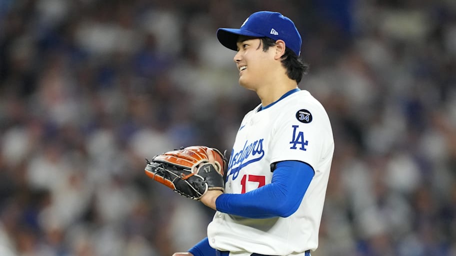Los Angeles Dodgers two-way player Shohei Ohtani (17) reacts in the seventh inning against the Milwaukee Brewers