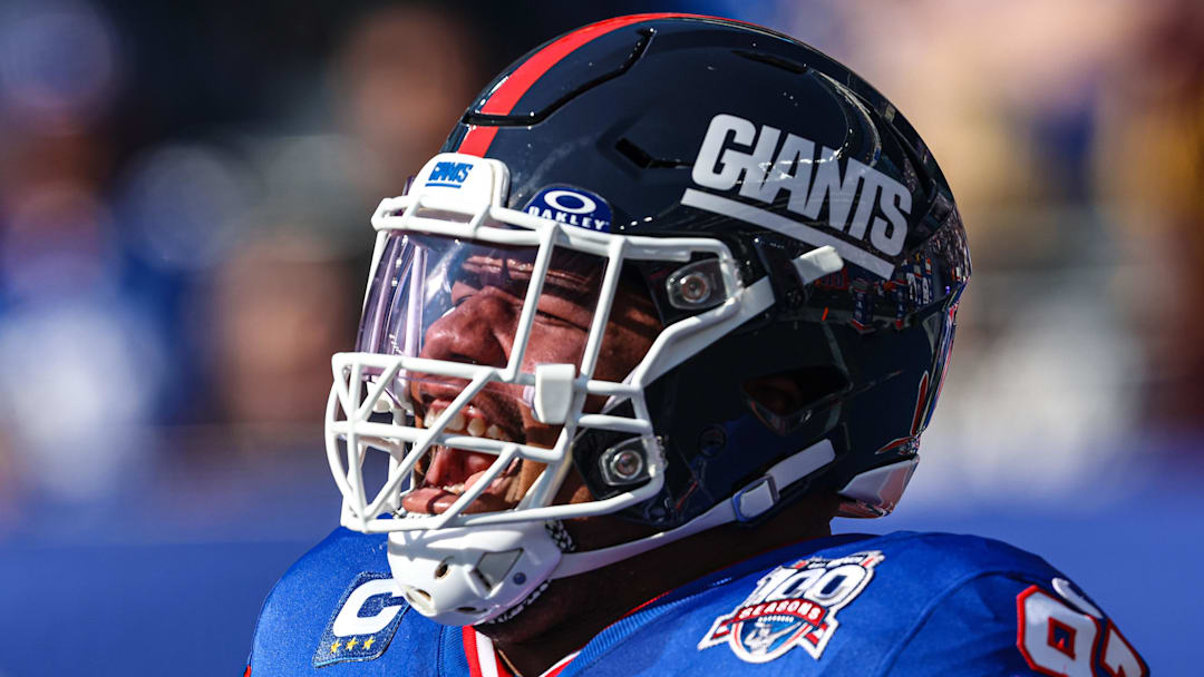Nov 3, 2024; East Rutherford, New Jersey, USA; New York Giants defensive tackle Dexter Lawrence II (97) reacts during introductions before the game against the Washington Commanders at MetLife Stadium. Mandatory Credit: Vincent Carchietta-Imagn Images