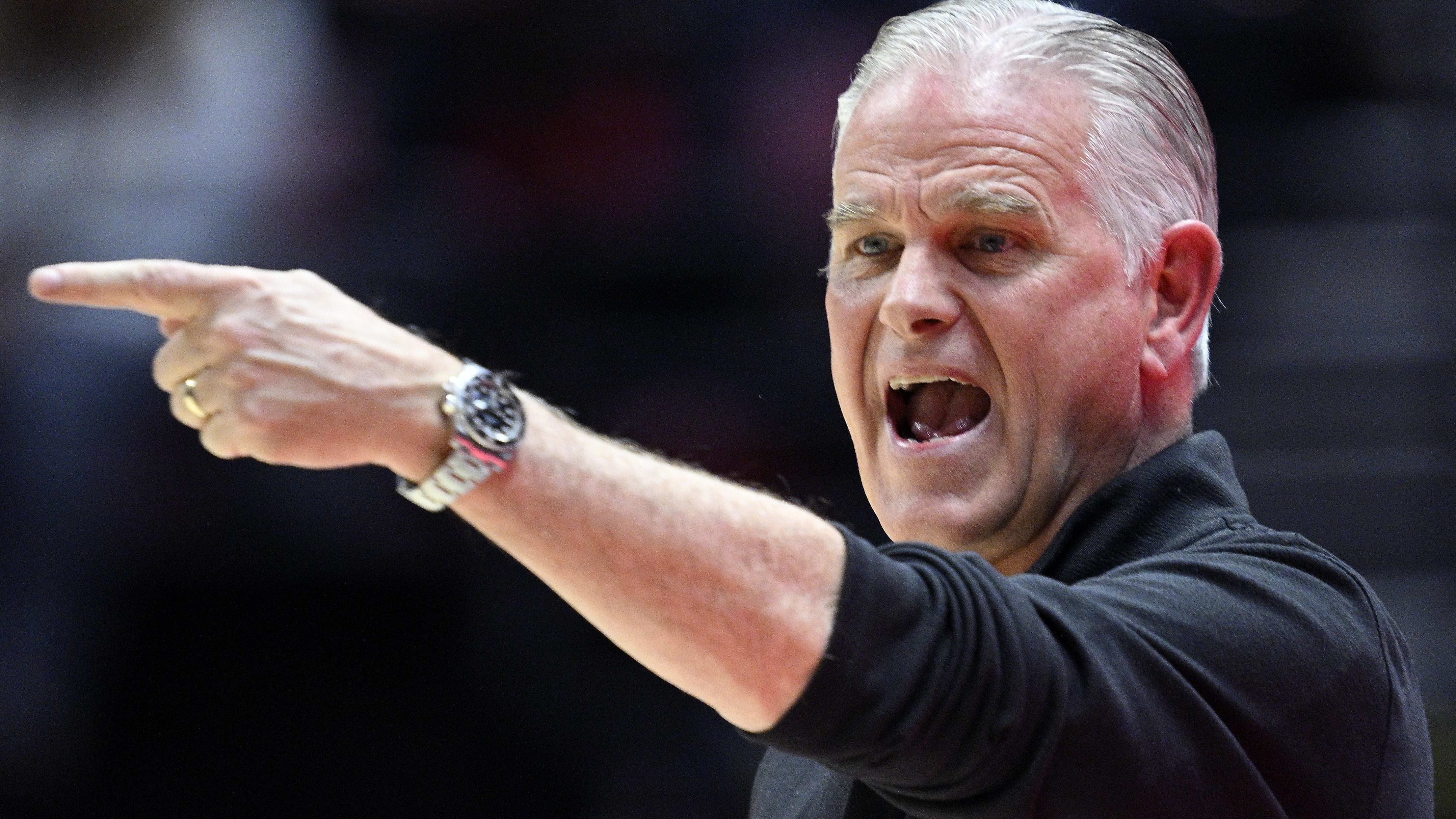 San Diego State coach Brian Dutcher gestures to his players