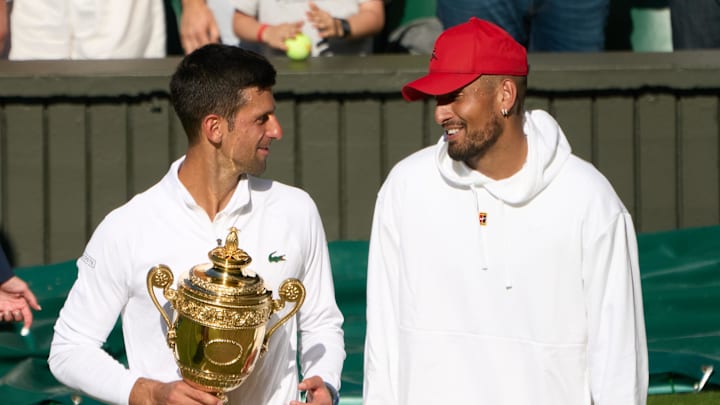 Novak Djokovic holds the 2022 Wimbledon trophy after beating Nick Kyrgios. Novak Djokovic holds the 2022 Wimbledon trophy after beating Nick Kyrgios.