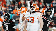 Clemson Tigers center Ryan Linthicum (53) celebrates Clemson Tigers running back Adam Randall's touchdown as the Tigers beat Louisville at L&N Stadium in Louisville, Kentucky Friday, Nov. 14, 2025.
