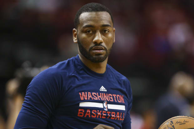 Washington Wizards guard John Wall (2) warms up before a game against the Houston Rockets at Toyota Center.