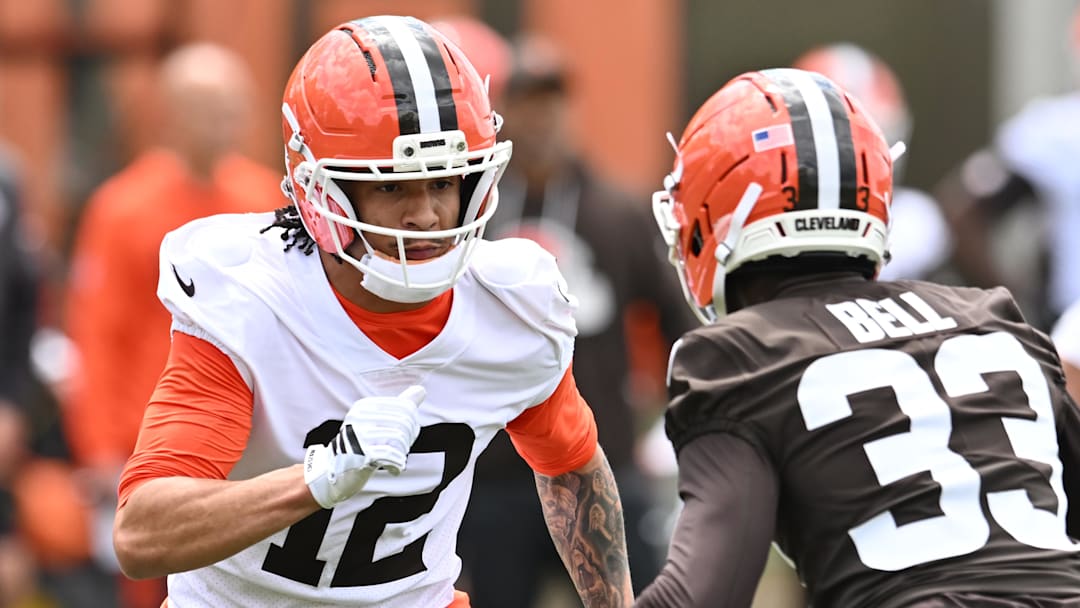 May 8, 2026; Berea, OH, USA; Cleveland Browns wide receiver Denzel Boston (12) runs a route against cornerback Malcolm Bell (33) during rookie minicamp at CrossCountry Mortgage Campus. Mandatory Credit: Ken Blaze-Imagn Images