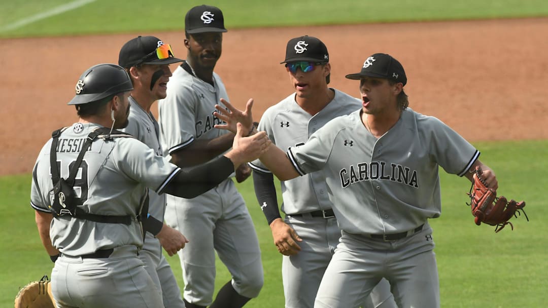 May 22 2024; Hoover, AL, USA; South Carolina players including pitcher Garrett Gainey and catcher Cole Messina celebrate after the Gamecocks held on for a 6-5 win over Arkansas at the Hoover Met during the SEC Tournament.