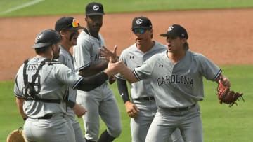 South Carolina baseball pitcher Garrett Gainey celebrating with his Gamecock teammates
