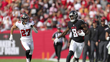 Oct 22, 2023; Tampa, Florida, USA;  Atlanta Falcons tight end Kyle Pitts (8) is chased out of bounds
