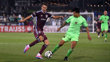 Aug 9, 2024; Commerce City, Colorado, USA; Colorado Rapids midfielder Cole Bassett (23) handles the ball against FC Juarez midfielder Dieter Villalpando (10) during the second half at Dick's Sporting Goods Park. Mandatory Credit: Christopher Hanewinckel-USA TODAY Sports