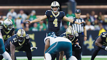 Sep 22, 2024; New Orleans, Louisiana, USA; New Orleans Saints quarterback Derek Carr (4) calls a play at the line against the Philadelphia Eagles during the second half at Caesars Superdome. Mandatory Credit: Stephen Lew-Imagn Images