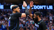 Feb 22, 2024; Dallas, Texas, USA;  Dallas Mavericks guard Kyrie Irving (11) celebrates with Dallas Mavericks center Daniel Gafford (21) during the second half against the Phoenix Suns at American Airlines Center. Mandatory Credit: Kevin Jairaj-Imagn Images