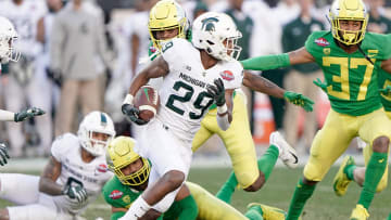 Dec 31, 2018; Santa Clara, CA, USA; Michigan State Spartans cornerback Shakur Brown (29) runs the football against the Oregon Ducks during the fourth quarter at Levi's Stadium. Mandatory Credit: Stan Szeto-USA TODAY Sports