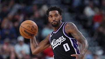 Oct 15, 2024; Salt Lake City, Utah, USA; Sacramento Kings guard Malik Monk (0) passes the ball against the Utah Jazz during the third quarter at Delta Center. Mandatory Credit: Rob Gray-Imagn Images