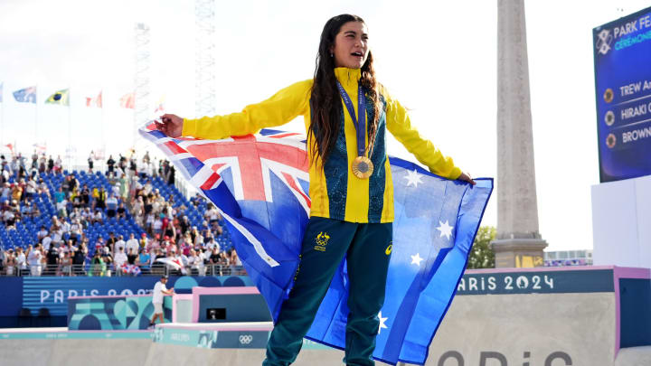 Arisa Trew (AUS) celebrates winning the gold medal in the women’s skateboarding park finals during the Paris 2024 Olympic Summer Games at La Concorde 4.