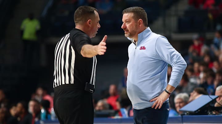 Jan 4, 2025; Oxford, Mississippi, USA; Mississippi Rebels head coach Chris Beard talks with an official during the first half against the Georgia Bulldogs at The Sandy and John Black Pavilion at Ole Miss. Mandatory Credit: Petre Thomas-Imagn Images Jan 4, 2025; Oxford, Mississippi, USA; Mississippi Rebels head coach Chris Beard talks with an official during the first half against the Georgia Bulldogs at The Sandy and John Black Pavilion at Ole Miss. Mandatory Credit: Petre Thomas-Imagn Images