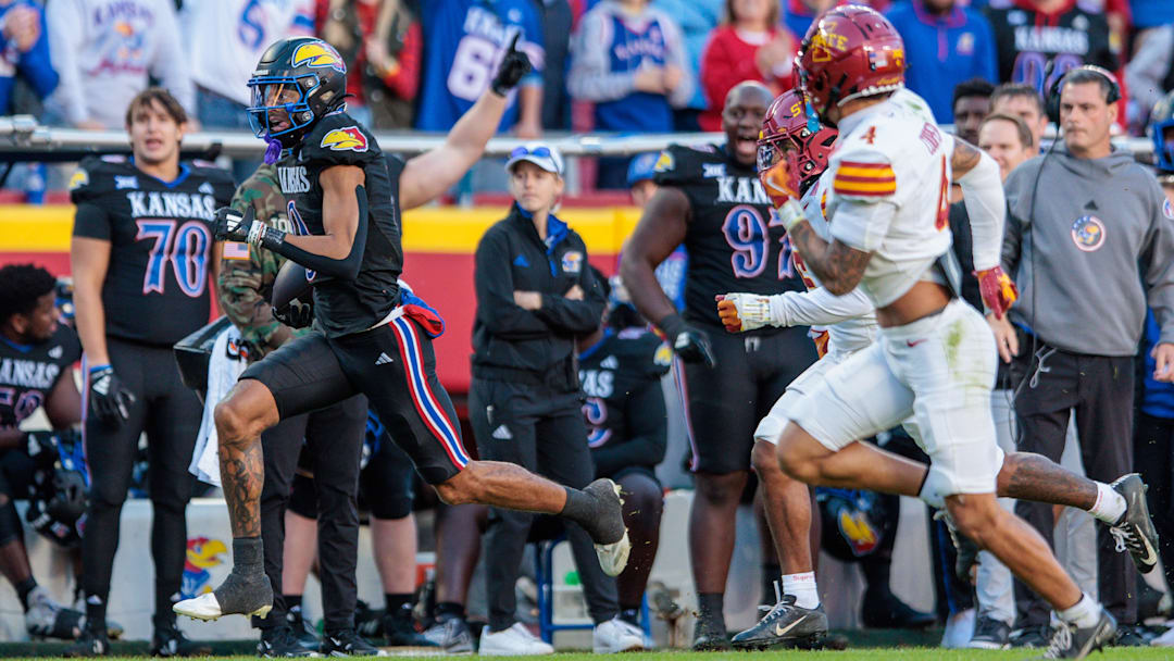 Kansas Jayhawks wide receiver Quentin Skinner (0) runs free in the secondary as Iowa State defenders try to catch him Saturday at Arrowhead Stadium. Kansas Jayhawks wide receiver Quentin Skinner (0) runs free in the secondary as Iowa State defenders try to catch him Saturday at Arrowhead Stadium.