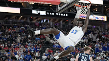 Nov 3, 2025; Las Vegas, Nevada, USA; BYU Cougars center Keba Keita (13) dunks against the Villanova Wildcats during the first half of the Hall of Fame Series game at T-Mobile Arena. Mandatory Credit: Candice Ward-Imagn Images