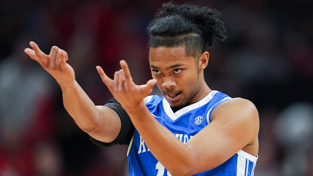 Kentucky Wildcats guard Jaland Lowe (15) celebrates his score in the first half during the UofL-UK annual rivalry game at the KFC Yum! Center in Louisville, Kentucky Nov. 11, 2025.
