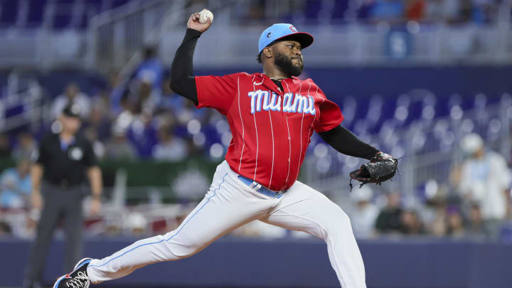 Jul 22, 2023; Miami, Florida, USA; Miami Marlins starting pitcher Johnny Cueto (47) pitches against the Colorado Rockies during the first inning at loanDepot Park.