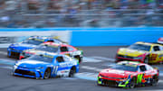Nov 2, 2025; Avondale, Arizona, USA; NASCAR Cup Series driver Denny Hamlin (11) drives ahead of driver Chase Briscoe (19) driver Kyle Larson (5) and driver William Byron (24) during the Cup Series Championship race at Phoenix Raceway.