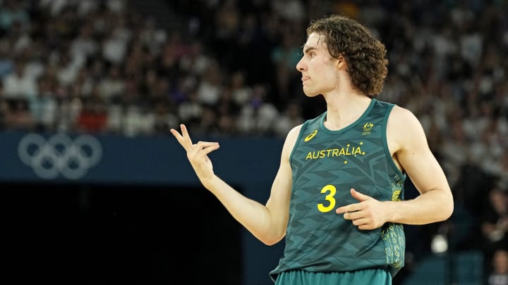 Aug 6, 2024; Paris, France; Australia guard Josh Giddey (3) reacts after making a three pointer during the first half against Serbia in men’s basketball quarterfinals during the Paris 2024 Olympic Summer Games at Accor Arena. Mandatory Credit: Kyle Terada-USA TODAY Sports