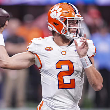 Aug 31, 2024; Atlanta, Georgia, USA; Clemson Tigers quarterback Cade Klubnik (2) passes against the Georgia Bulldogs during the first half at Mercedes-Benz Stadium.