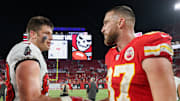 Oct 2, 2022; Tampa, Florida, USA;  Kansas City Chiefs tight end Travis Kelce (87) greets Tampa Bay Buccaneers tight end Cade Otton (88) after a game at Raymond James Stadium. Mandatory Credit: Nathan Ray Seebeck-Imagn Images