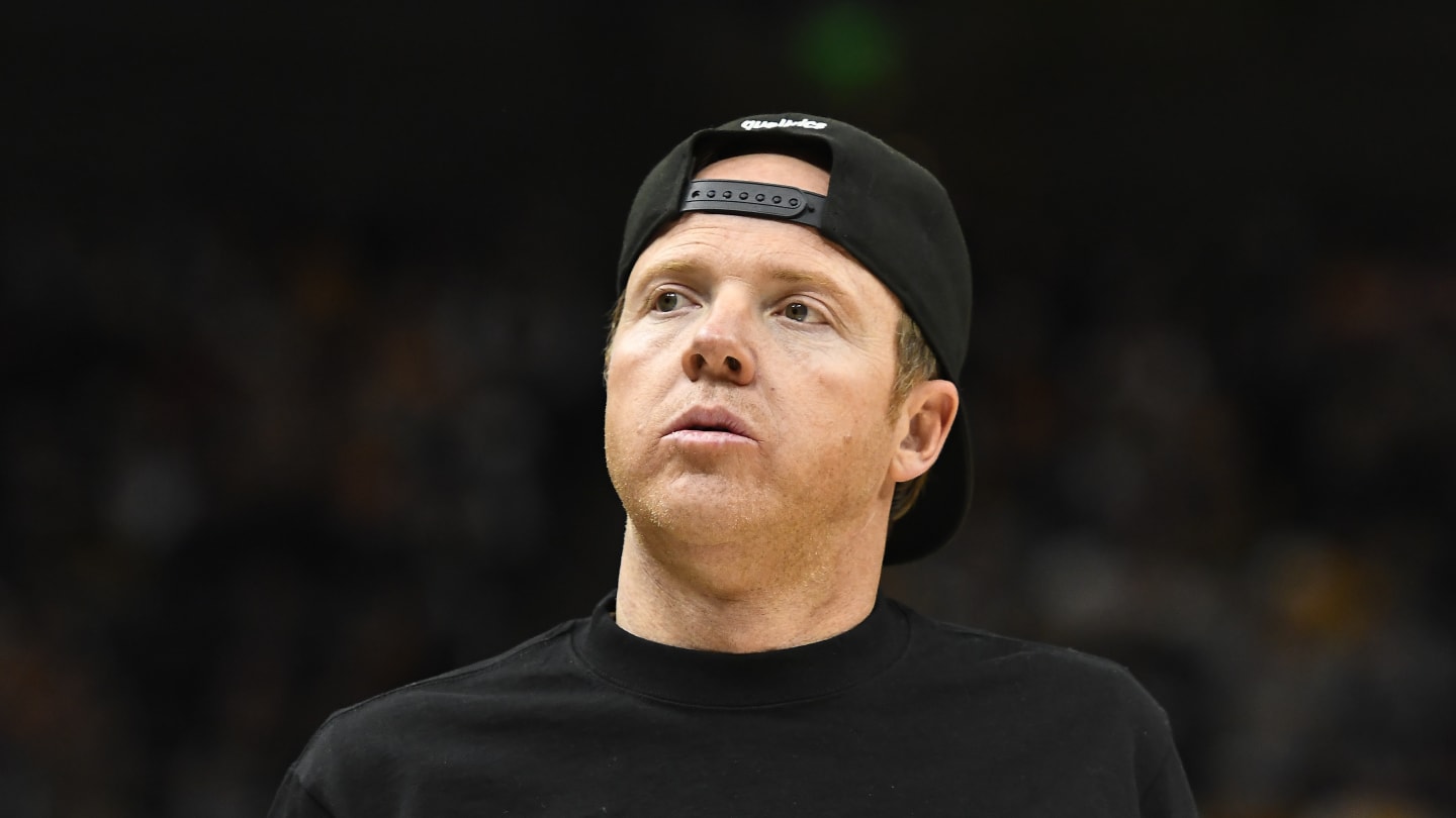 Colin Cowherd Criticizes J.J. Redick and Utah Jazz Owner for Backward Hat Controversy