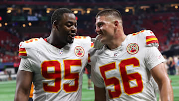 Sep 22, 2024; Atlanta, Georgia, USA; Kansas City Chiefs defensive tackle Chris Jones (95) and defensive end George Karlaftis (56) talk after a victory over the Atlanta Falcons at Mercedes-Benz Stadium. Mandatory Credit: Brett Davis-Imagn Images