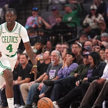 Mar 24, 2025; Sacramento, California, USA; Boston Celtics guard Jrue Holiday (4) dribbles the ball against the Sacramento Kings in the first quarter at the Golden 1 Center. Mandatory Credit: Cary Edmondson-Imagn Images