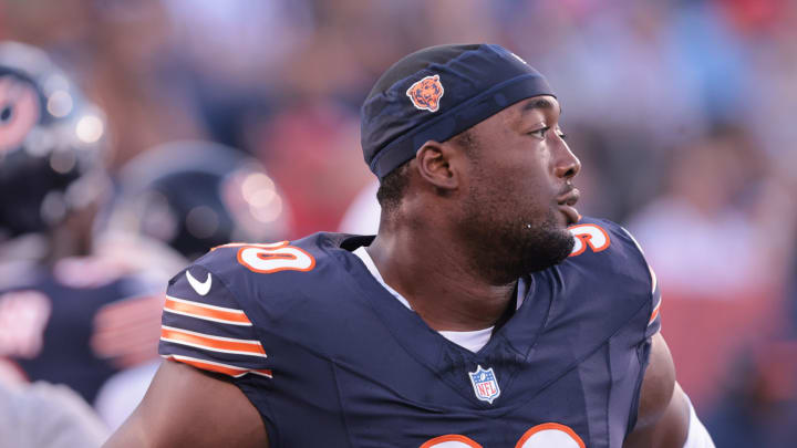 Dominique Robinson, a McKinley High School graduate, enters his third season with the Bears looking to solidify his roster spot. Here he warms up before the 2024 Pro Football Hall of Fame game at Benson Stadium in Canton Thursday, August 1, 2024.