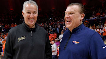 Mar 5, 2024; Champaign, Illinois, USA; Purdue Boilermakers head coach Matt Painter and Illinois Fighting Illini head coach Brad Underwood chat before the start of the game at State Farm Center. Mandatory Credit: Ron Johnson-Imagn Images