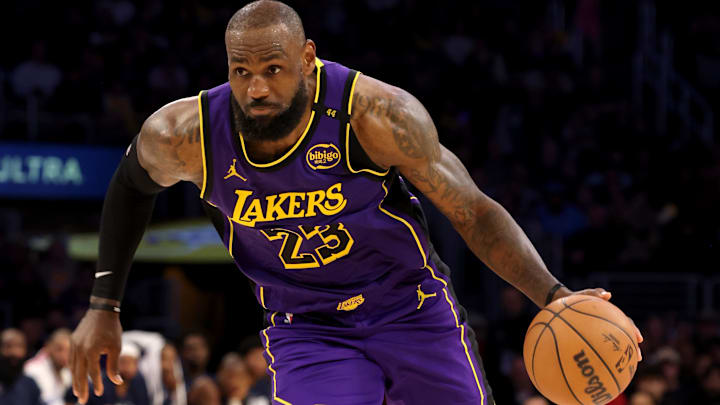 Feb 28, 2025; Los Angeles, California, USA; Los Angeles Lakers forward LeBron James (23) drives during the fourth quarter against the LA Clippers at Crypto.com Arena. Mandatory Credit: Jason Parkhurst-Imagn Images